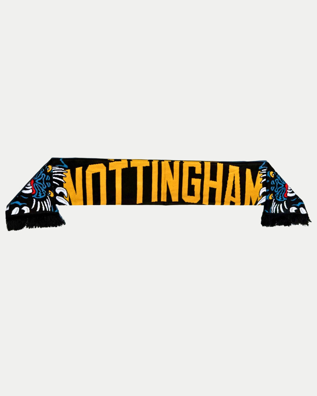 The Panthersland 25-26 Big City Text Scarf is black with bold yellow NOTTINGHAM lettering and blue, red, and white decorative patterns on each end—the perfect accessory for any team supporter.
