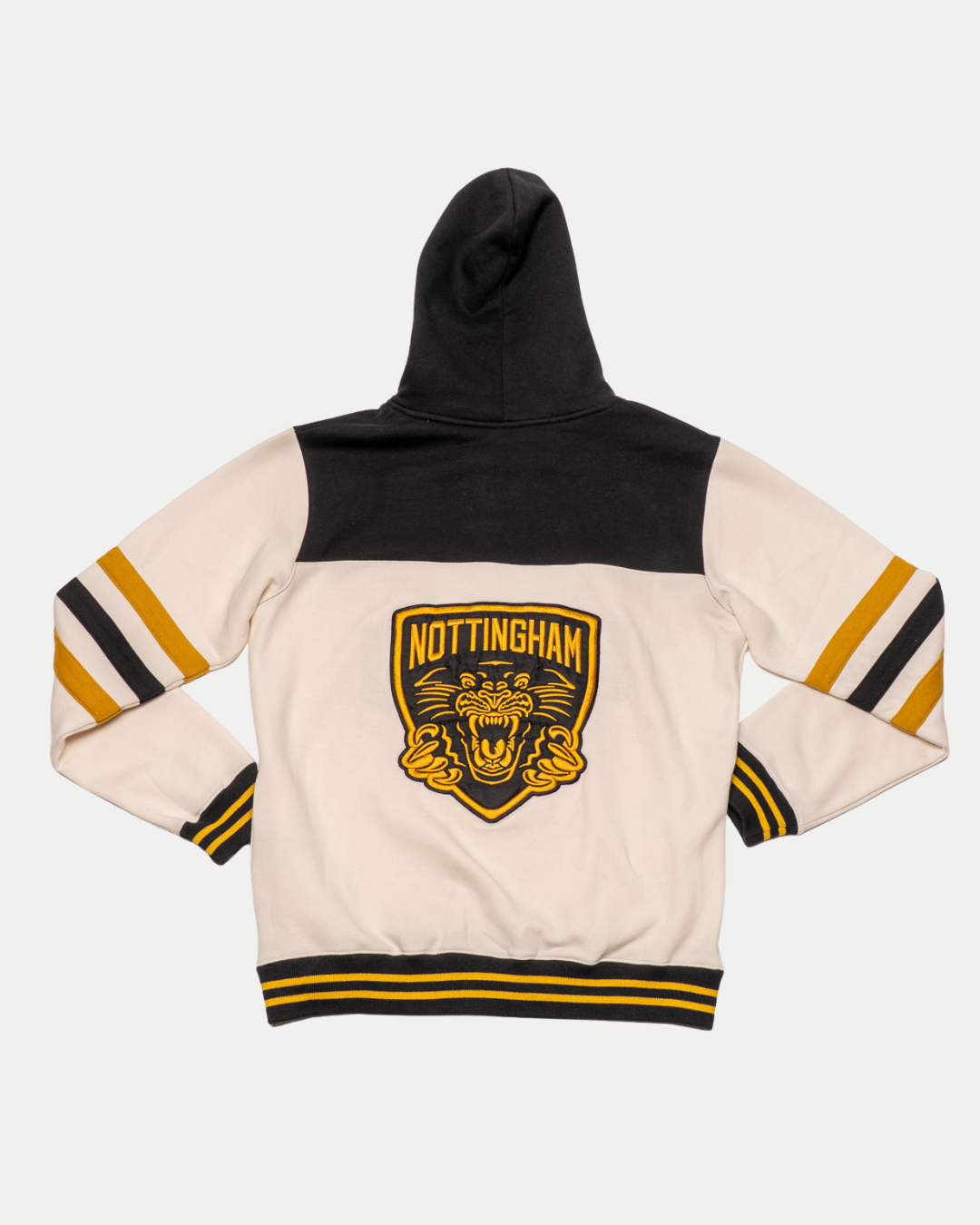 The Nottingham Panthers 25-26 Off White Script Hoodie by Panthersland features cream sleeves, black and yellow striped cuffs, a large Nottingham Panthers patch above a roaring tiger on the back, and a black hood and shoulders—a fan favourite.
