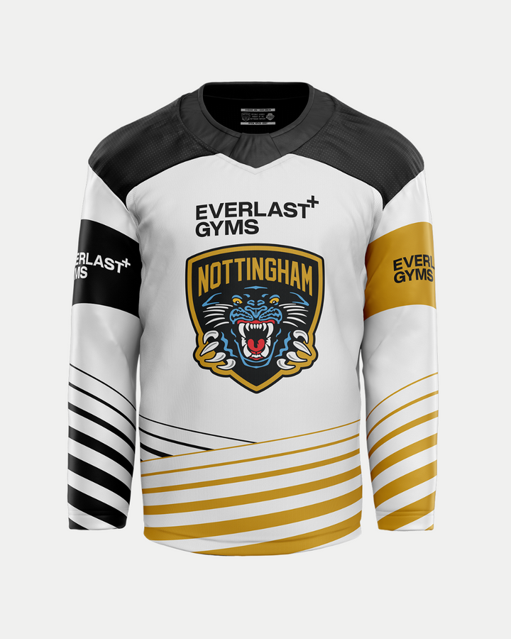 The 2025/26 Classic Replica Away Warm-Up Jersey by Panthersland features a white sublimated design with black and gold sleeve stripes, a bold Nottingham Panthers logo, and Everlast Gyms text. Check the size guide for your perfect fit.