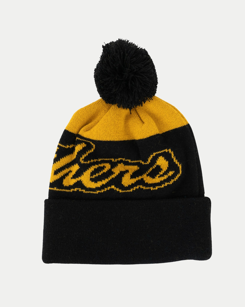 The Nottingham Panthers 25-26 Beanie Black POM by Panthersland features black and yellow knit, a pom-pom top, and partial cursive text on the front—perfect for the season—shown against a plain white background.