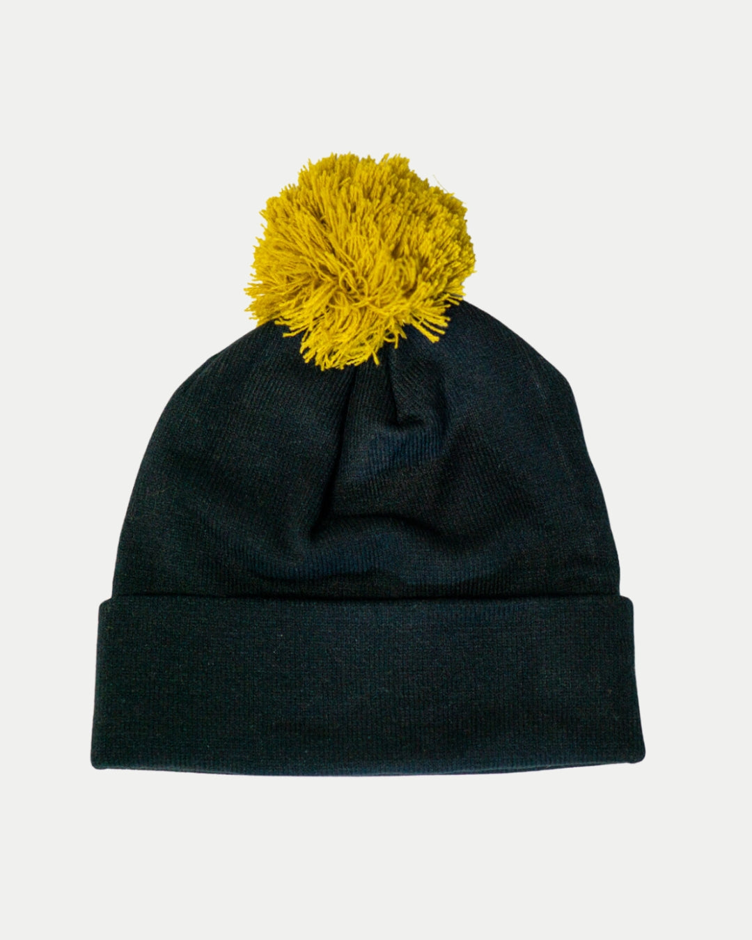 The Nottingham Panthers 25-26 Charcoal Crest Pom Knit by Panthersland features a folded brim and a large yellow pom-pom, shown on a plain white background.