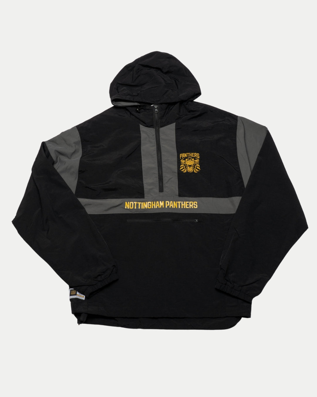 The Panthersland Nottingham Panthers 25-26 Black Anorak is a water-resistant hooded pullover jacket with a front zipper, elastic cuffs, the team logo on the chest, and Nottingham Panthers in yellow across the front.