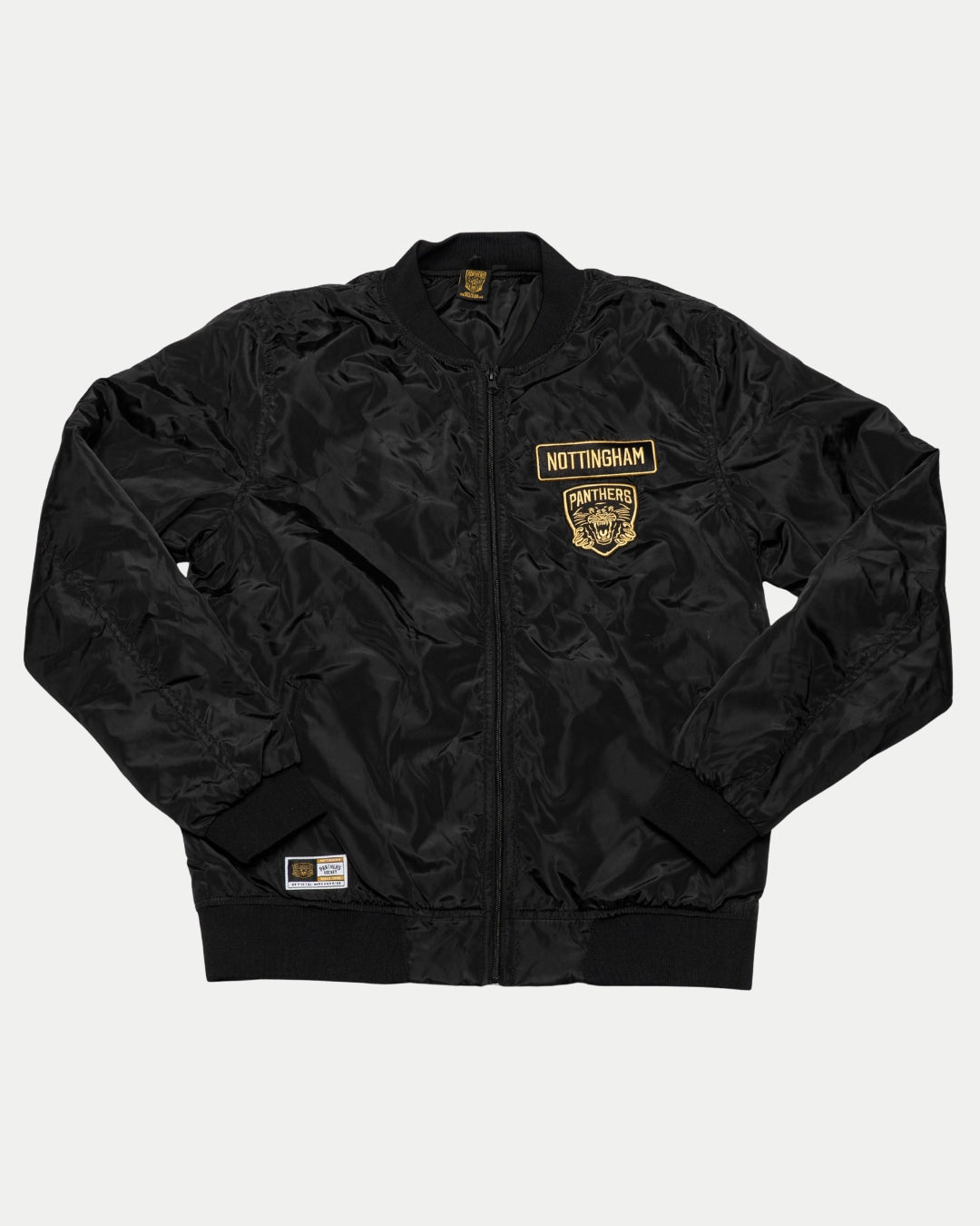 The Panthersland Nottingham Panthers Bomber Jacket 25-26 is black with ribbed cuffs, collar, and hem. Yellow chest embroidery includes Nottingham and a Panthers crest with the text PANTHERS.