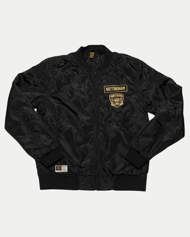The Panthersland Nottingham Panthers Bomber Jacket 25-26 is black with ribbed cuffs, collar, and hem. Yellow chest embroidery includes Nottingham and a Panthers crest with the text PANTHERS.