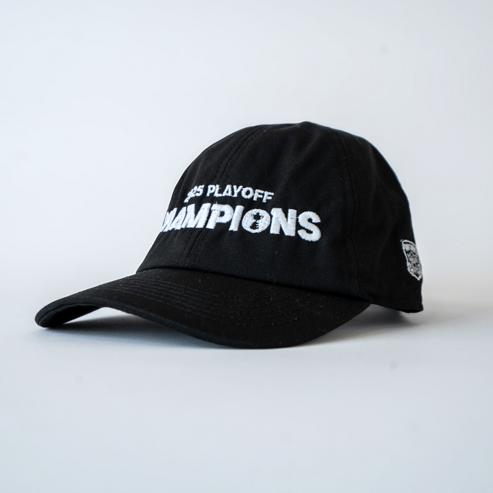 The Nottingham Panthers Made To Order Playoff Champions Panthers 2025 Organic Cotton Dad Cap in black & white features white embroidered PS PLAYOFF CHAMPIONS text on the front and is shown against a plain white background.