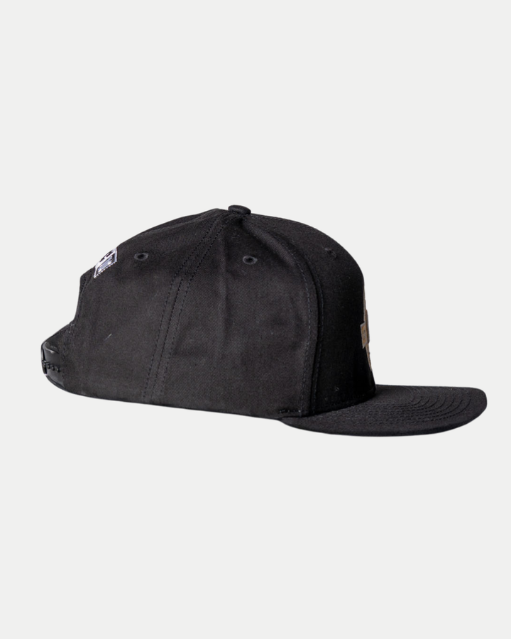 The Panthersland Nottingham Panthers 25-26 CCM Black Flatbrim Snapback is shown from the side with a flat brim and visible stitching, set against a plain light background.