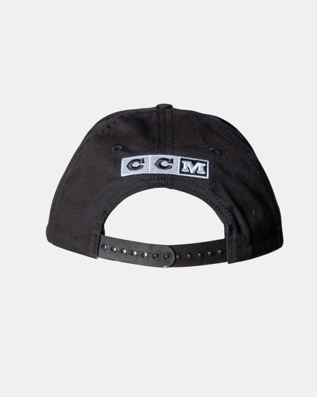 The Nottingham Panthers 25-26 CCM Black Flatbrim Snapback by Panthersland is shown from the back, featuring an adjustable snapback strap and a stitched white CCM logo patch above the opening.