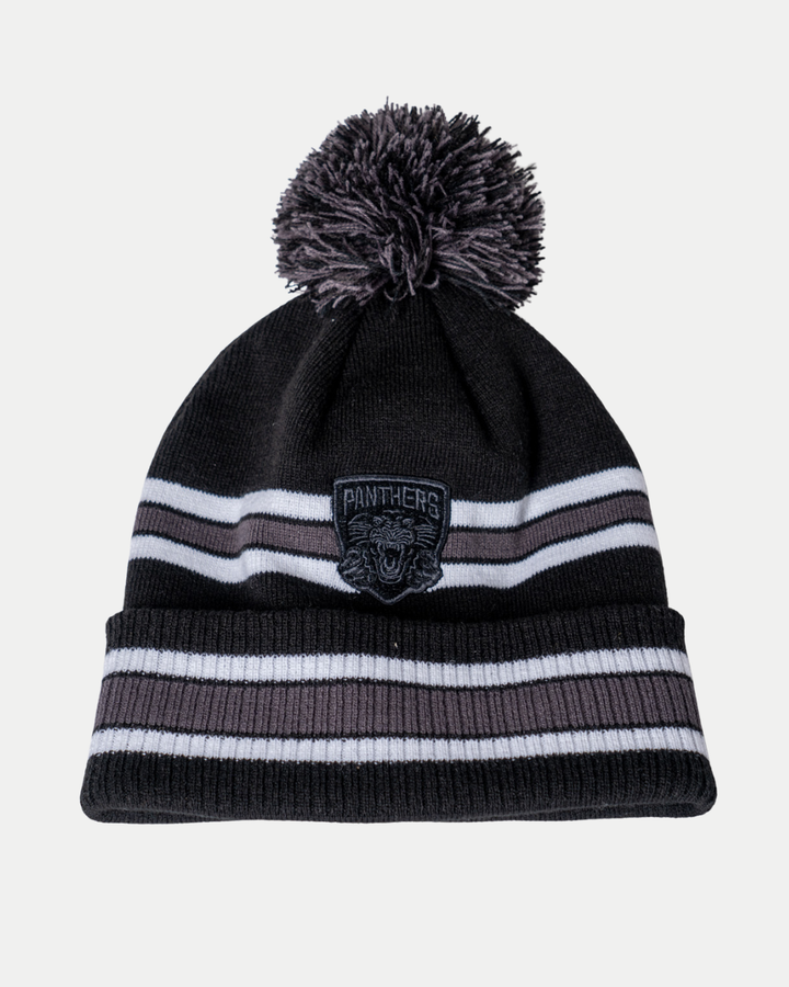 The Panthersland Nottingham Panthers 25-26 CCM White Stripe Pom Knit is a black beanie with white and gray stripes, a pom-pom, and a cuff patch displaying a panther logo and "Panthers".