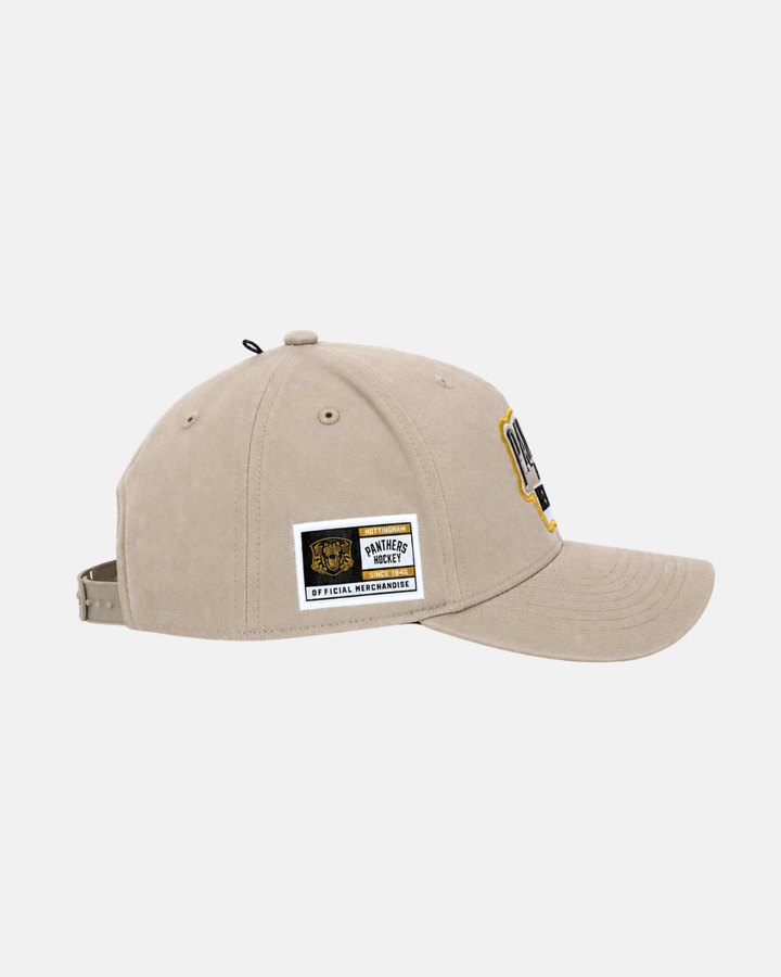 Introducing the Panthersland 26-27 Vintage Snapback: a beige cotton adjustable cap featuring a patch that reads SPITFIRES HOCKEY OFFICIAL MERCHANDISE and a tiger logo on the side. This hat comes with an adjustable strap at the back and a curved brim for all-day comfort.