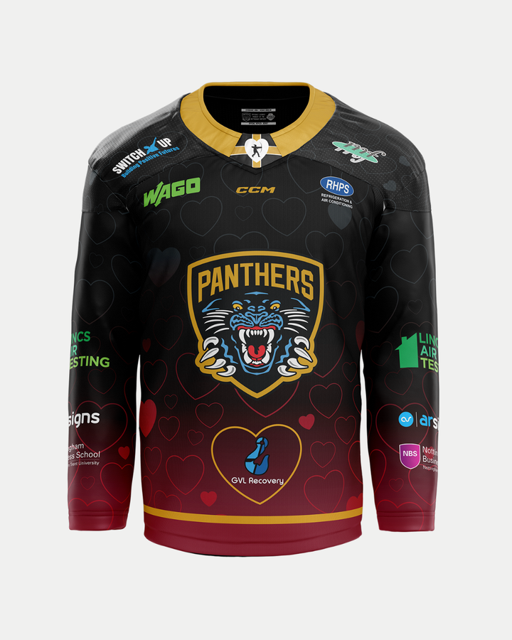 The Panthersland 2025/26 Classic Replica Valentines Jersey features a black design with a roaring panther logo, PANTHERS text, heart patterns, sponsor logos, maroon and gold trim, multicolored patches, and a blue heart icon at the bottom center.