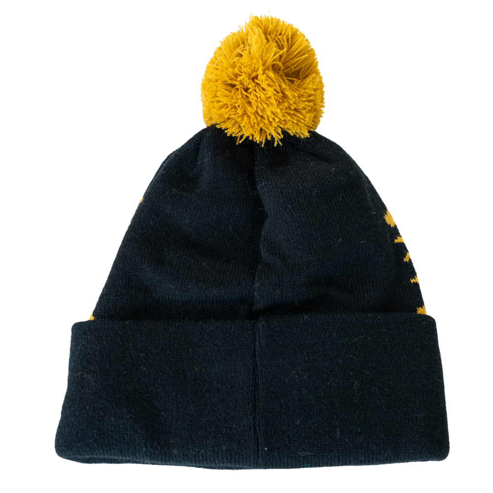 The Panthersland Nottingham Panthers 25-26 Beanie Gold POM features a black knit design, wide folded brim, and large yellow pom-pom—perfect for showing your team spirit this season.