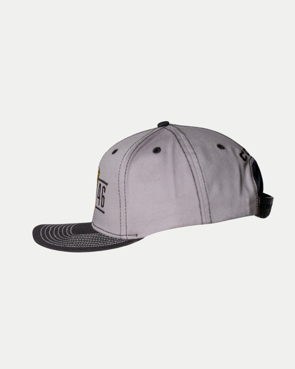 The Panthersland Nottingham Panthers 25-26 CCM Grey Flat Brim Snapback features a gray design with dark gray brim, visible stitching, number 46, and yellow details on the front, shown in a side view on a white background.