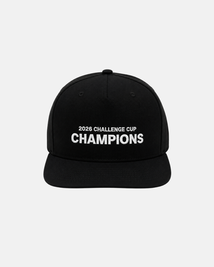 The Nottingham Panthers 2026 Challenge Cup Champions Retro Snapback Cap, a black high-profile cap featuring white embroidered “2026 CHALLENGE CUP CHAMPIONS” text on the front, is displayed against a plain light gray background.