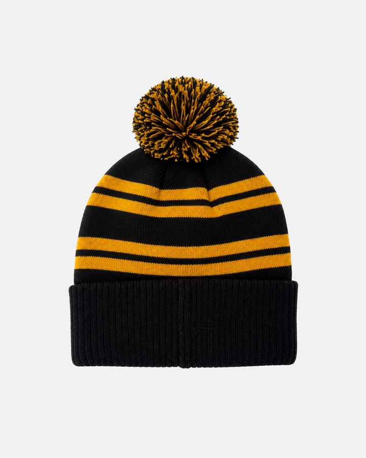Introducing the Panthersland 26-27 Script Pom Knit: a beanie showcasing black and yellow horizontal stripes, a black fold-up cuff, and a coordinating black and yellow pom-pom on top.