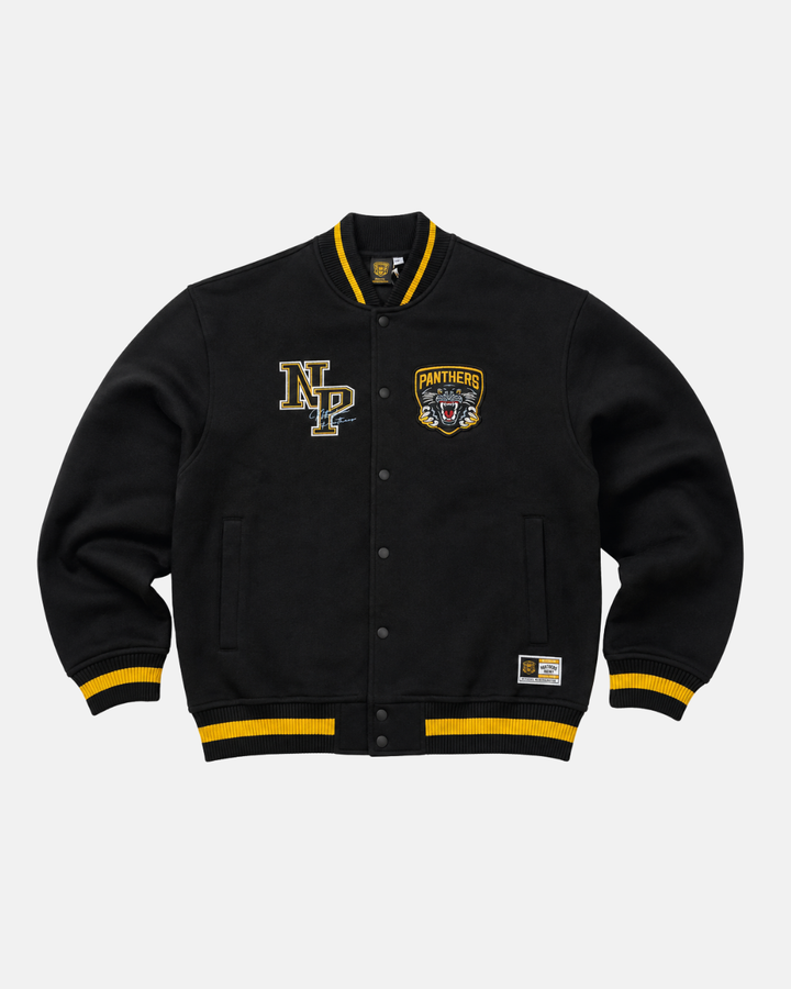 The 26-27 NP Varsity Sweater by Panthersland is a black collegiate-inspired jacket featuring yellow striped cuffs and collar, the signature NP letters on the left chest, and a bold panther logo patch with “Panthers” and “NP” on the right chest.