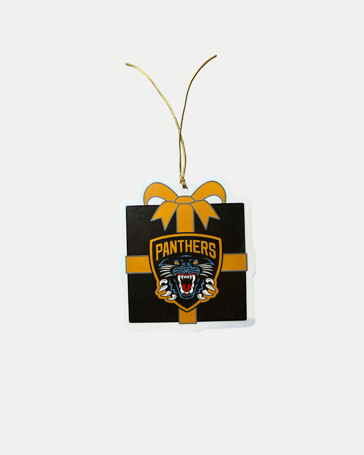 The Panthersland Wooden Present Christmas Tree Decoration features a gift-shaped ornament with a gold ribbon, the word "PANTHERS," and a roaring panther logo, hanging by a gold string against a white background.