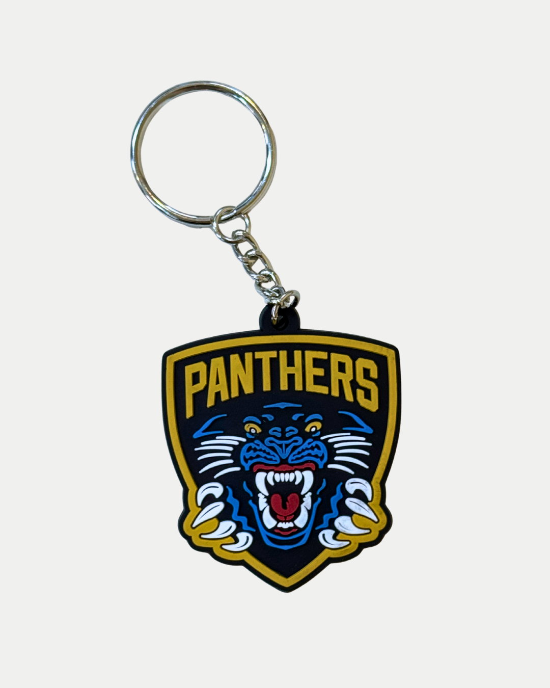 The Panthersland Nottingham Panthers PVC Keyring features a shield-shaped team crest with a blue panther, yellow claws, and bold yellow "PANTHERS" lettering—ideal for any Nottingham Panthers supporter.