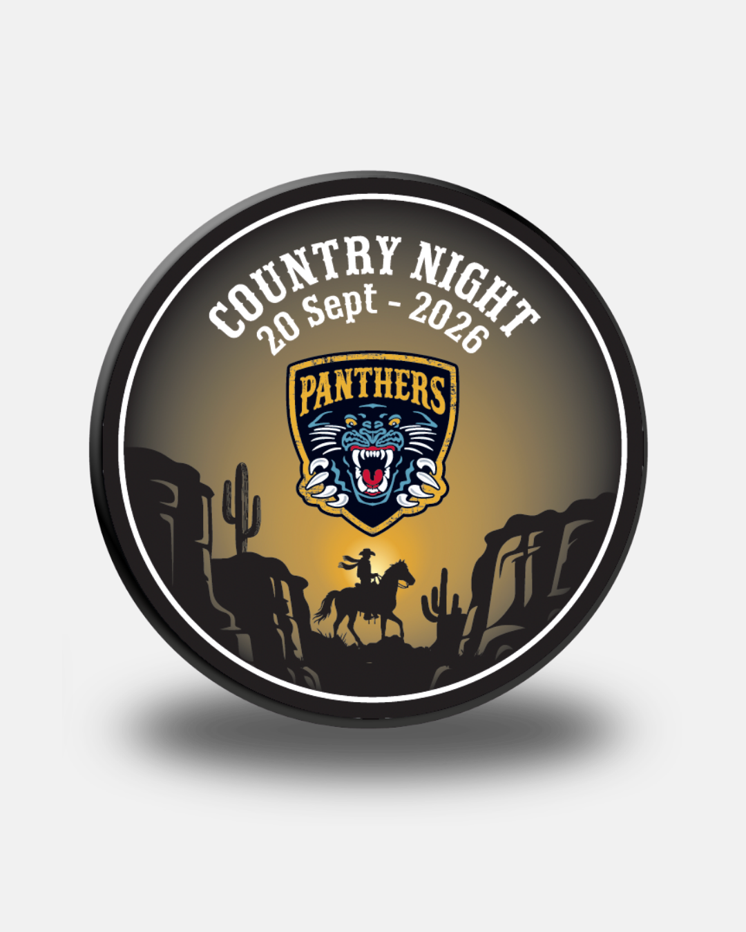 A circular Nottingham Panthers 26-27 Country Night Puck by Panthersland, featuring the date “20 Sept - 2026”, a Panthers logo, and a cowboy on horseback between cacti and cliffs against a sunset background.