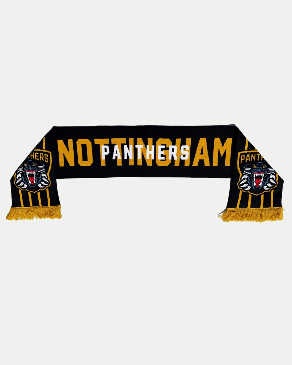 The Panthersland 25-26 Four Stripe Scarf features black and yellow stripes, roaring panther logos, yellow fringes, and bold NOTTINGHAM PANTHERS lettering—an ideal accessory for game day fans.
