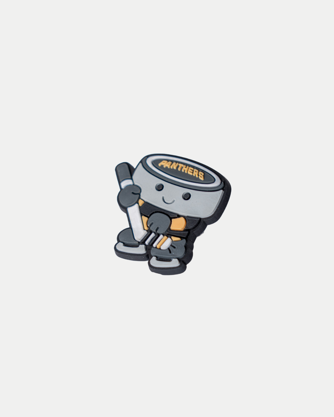 Show your team spirit with the Nottingham Panthers 25-26 Puck Croc Charm by Panthersland—a cute cartoon hockey puck character holding a stick, wearing gloves and shoes, with “Nottingham Panthers” on its head!.