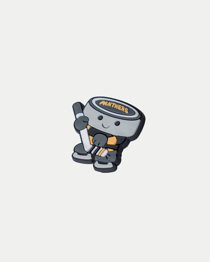 Show your team spirit with the Nottingham Panthers 25-26 Puck Croc Charm by Panthersland—a cute cartoon hockey puck character holding a stick, wearing gloves and shoes, with “Nottingham Panthers” on its head!.