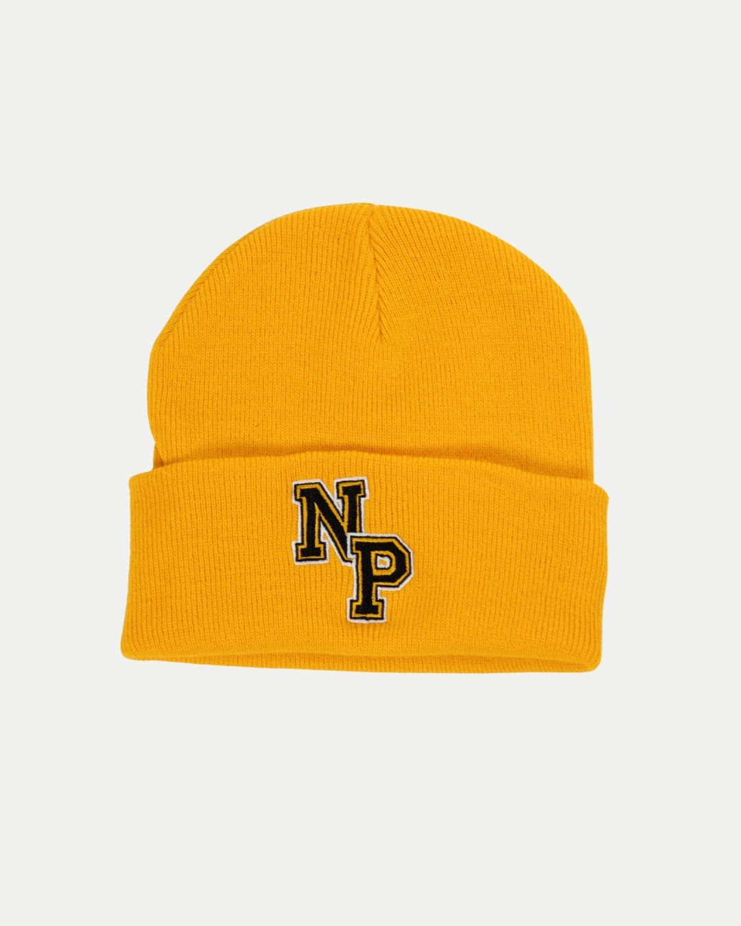 The Nottingham Panthers NP Logo Gold Beanie is a bright yellow knit hat with a folded brim and bold black-and-white embroidered NP letters on the front, adding a cozy pop of color to any outfit.
