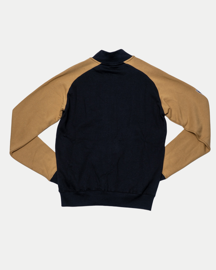 The Nottingham Panthers 25-26 CCM Track Jacket by Panthersland features a black body and tan sleeves, shown flat with the back facing up on a plain white background.