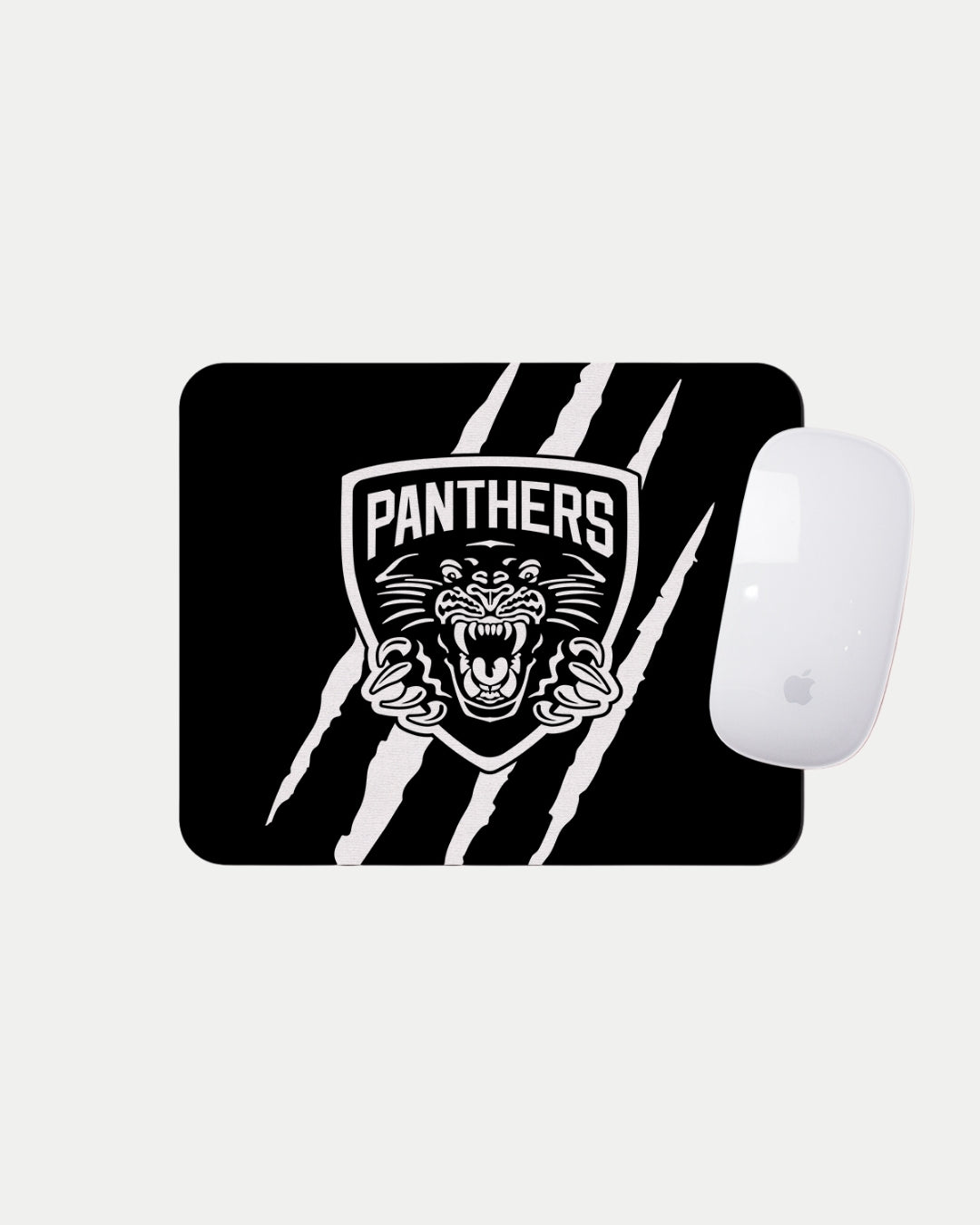 The Nottingham Panthers Black & White Slash Mousemat features a roaring panther logo, PANTHERS text, and three white claw marks. A white Apple Magic Mouse sits at the top right corner of this custom accessory.