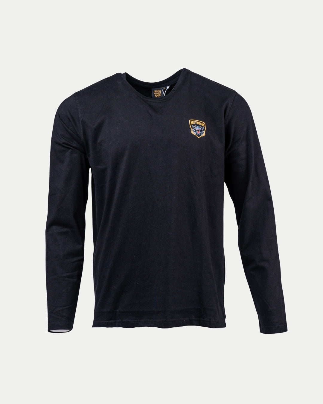 The Nottingham Panthers Golden Logo Black Long Sleeve features a small white and gold embroidered shield patch on the left chest. Displayed against a plain white background.