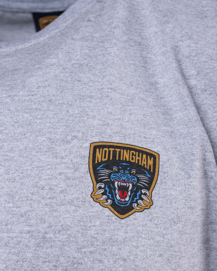 No keywords were provided to blend into the description. Please supply one or two keywords for integration with The Nottingham Panthers Logo Grey Long Sleeve.