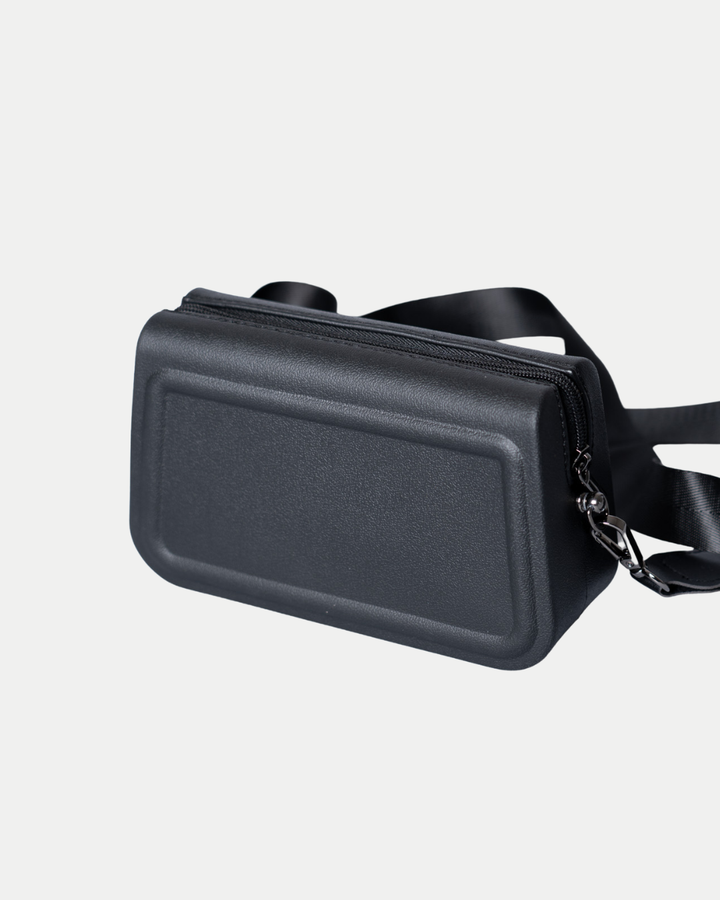 The Panthersland Nottingham Panthers Croc Charm Bag is a small, rectangular black crossbody with a textured surface, zip closure, and adjustable strap, shown on a plain white background.