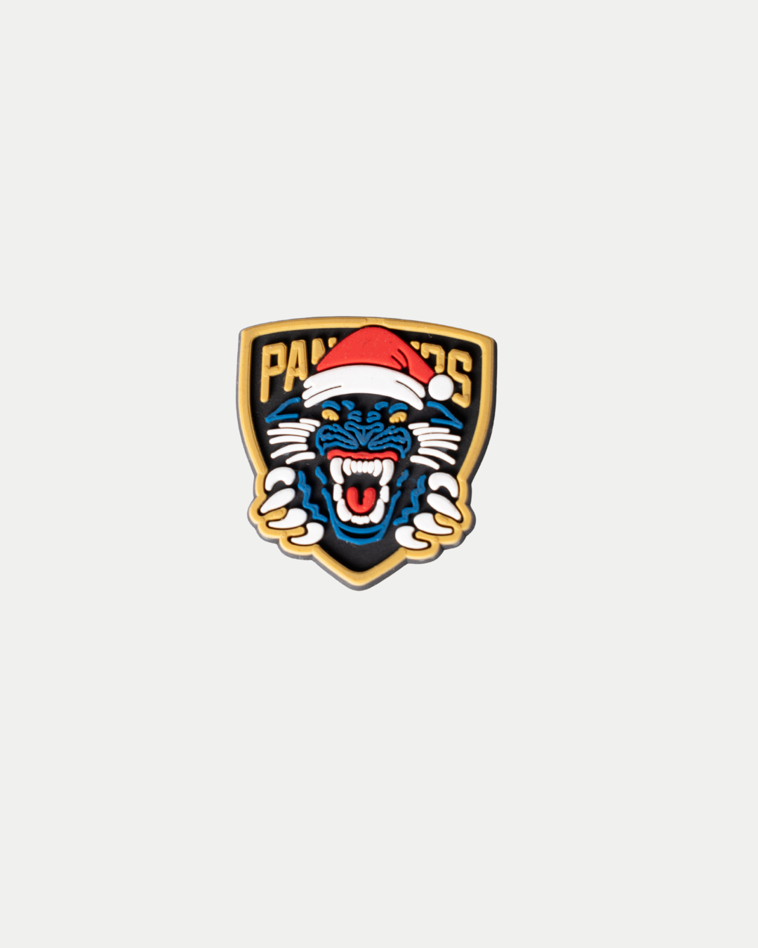 Celebrate the holidays with the Nottingham Panthers Santa Crest Croc Charm by Panthersland, featuring a blue panther in a red Santa hat under "PANTHERS" in gold on white—ideal for festive flair!.