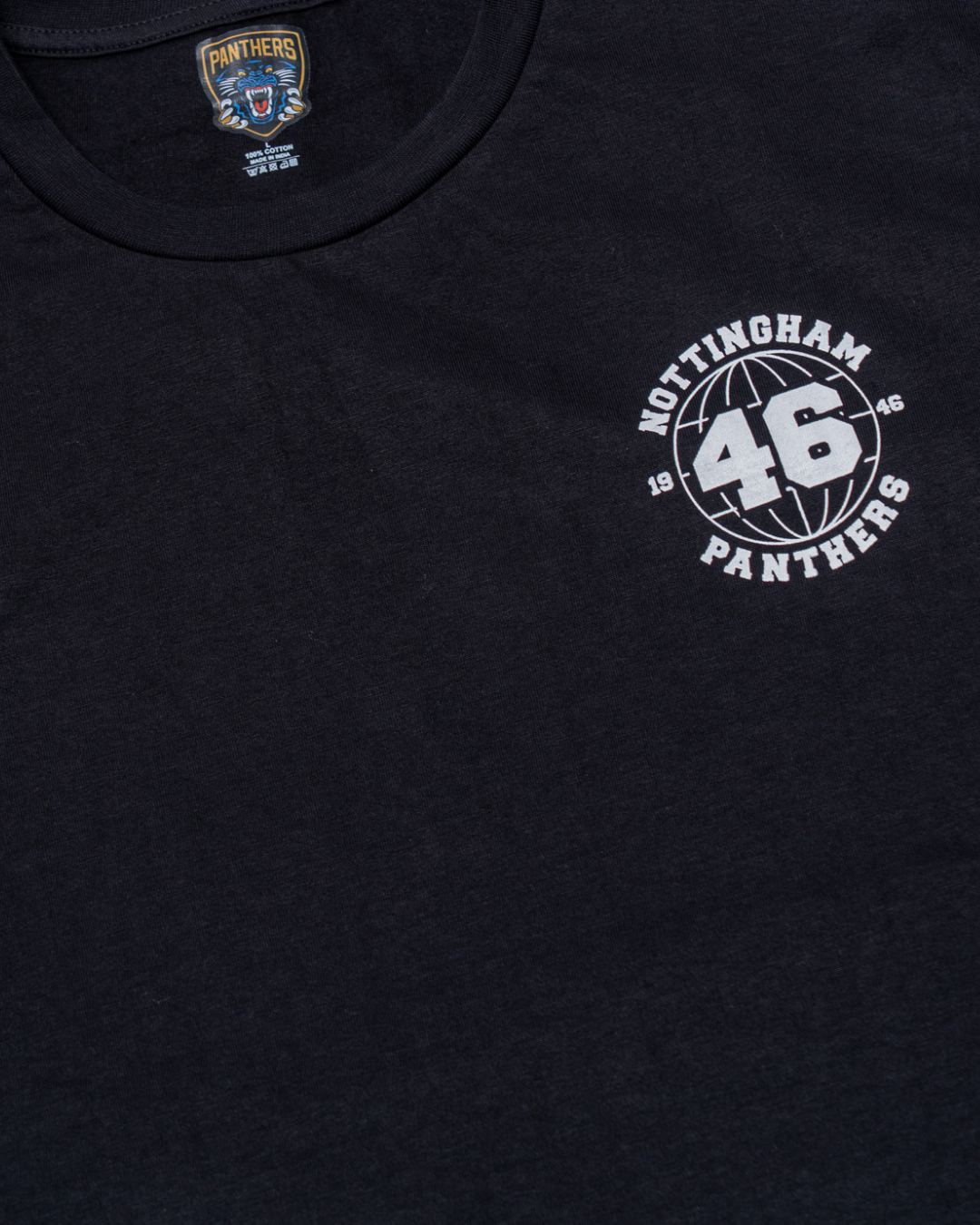 The Panthersland Nottingham Panthers 25-26 1946 Circle Logo T-Shirt is black with a small white "Nottingham Panthers 46" logo on the chest and a larger team emblem inside the neckline.