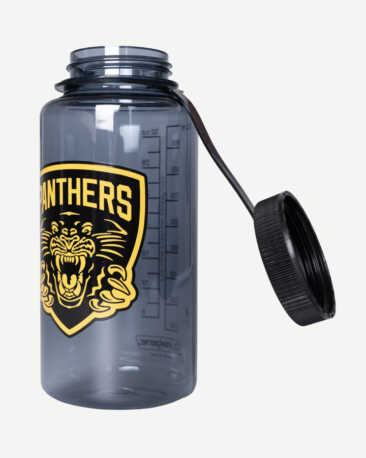 The Panthersland Panthers x Nalgene 1L Water Bottle is gray, BPA-free, and features a wide mouth, black screw-on lid with strap, yellow and black logo, and side measurement markings.