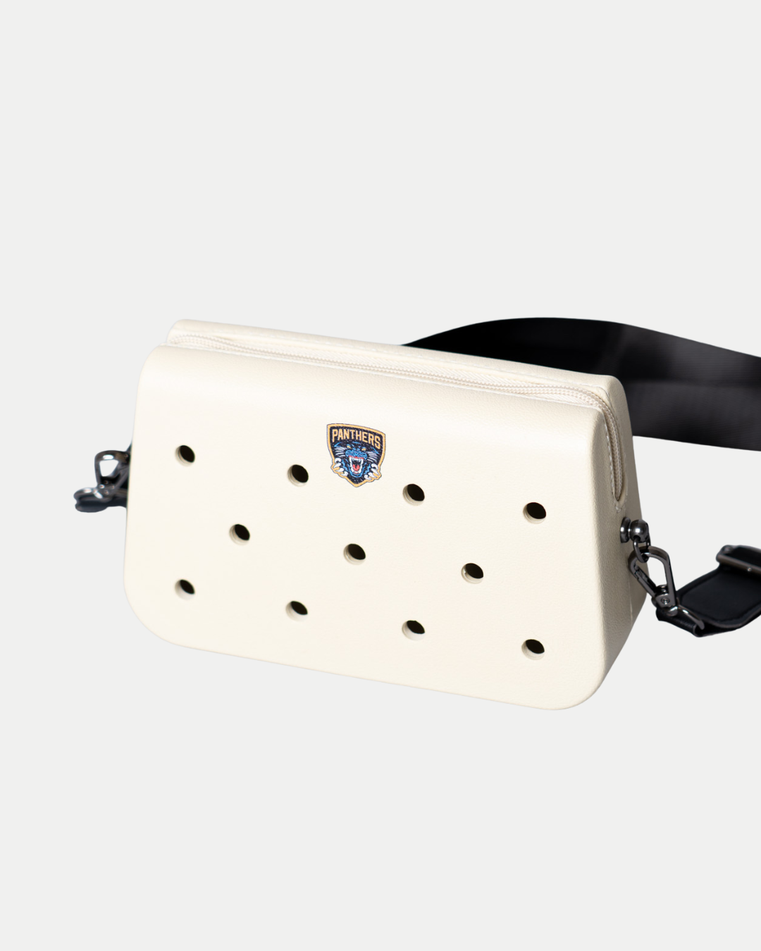 The Panthersland Nottingham Panthers Croc Charm Bag is a white rectangular crossbody with a black adjustable strap, featuring a small Panthers logo and evenly spaced round holes on the front.
