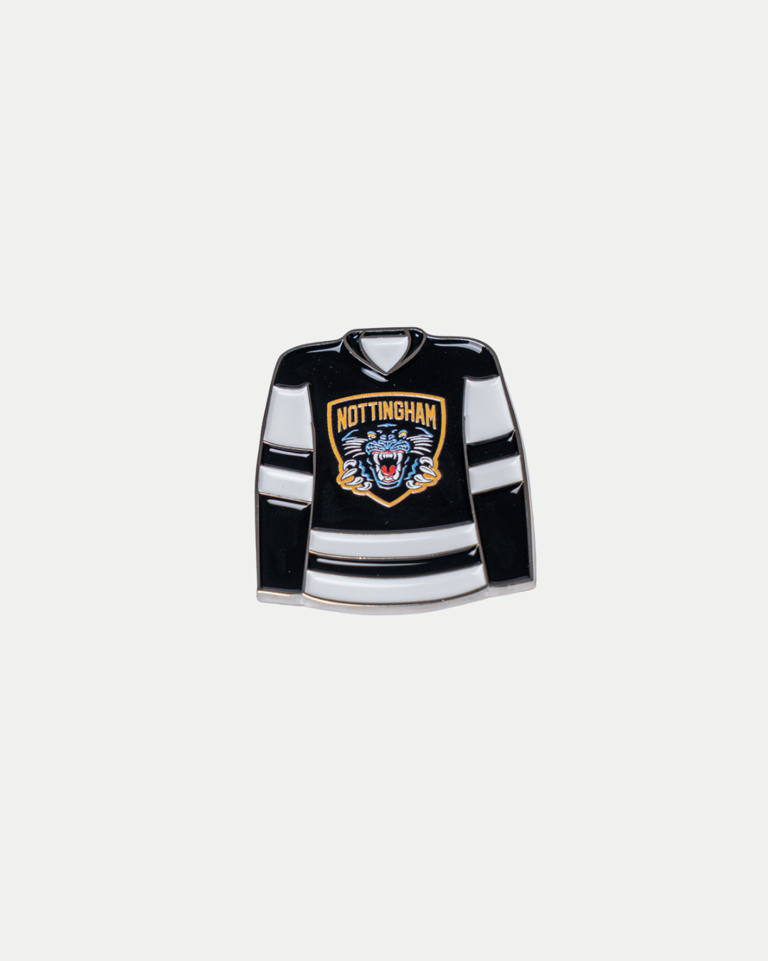 The Panthersland Nottingham Panthers Jersey Pin Badge features a black and white hockey jersey with a tiger logo and "Nottingham" on the front, shown against a plain white background.