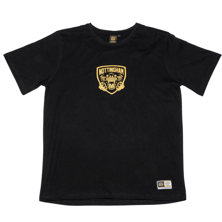 The Panthersland Kids Nottingham Panthers T-shirt Black (Large, Backprint 25-26) features a gold NOTTINGHAM logo and bold tiger graphic on the chest, plus a white and gold patch near the hem—making it a standout kids’ shirt.