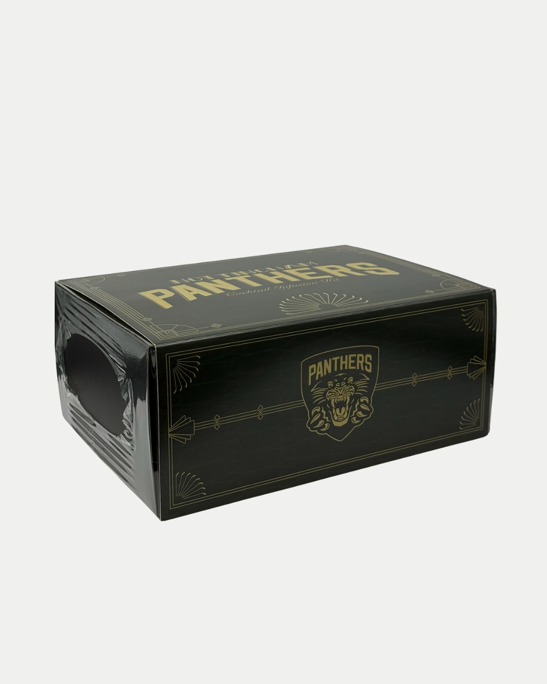 A sleek black tissue box with gold accents, featuring “PANTHERS” and a panther logo, sits stylishly next to the Nottingham Panthers Whiskey Smoker Kit by Panthersland, all set against a plain white background.