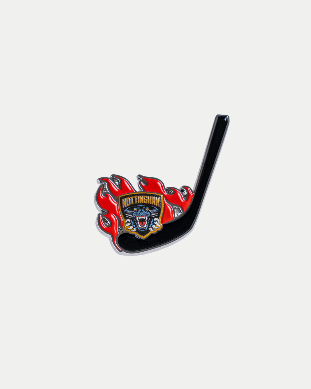 The Panthersland Nottingham Panthers Flame Stick Pin Badge features a black hockey stick with red flames and the team’s roaring panther logo at the center.