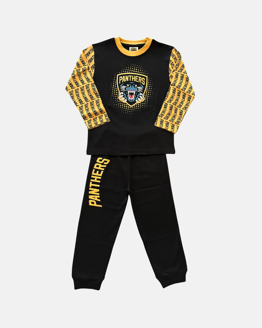 The Nottingham Panthers Junior Pyjamas by Panthersland are a black and yellow kids’ set featuring bold “PANTHERS” text, a striking panther graphic with the crest logo on the shirt, yellow patterned sleeves, and “PANTHERS” printed down the left pant leg—perfect for young Nottingham Panthers fans.