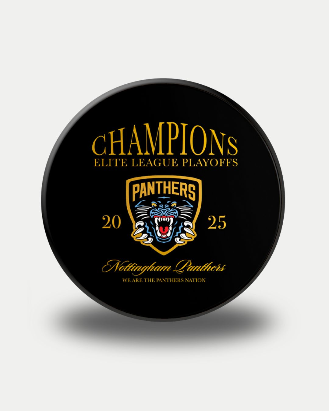 The Panthersland Nottingham Panthers Playoff Champions Puck 2025 Heritage is a black puck with CHAMPIONS ELITE LEAGUE PLAYOFFS in yellow, a roaring panther logo, the year 2025, and Nottingham Panthers in cursive below.