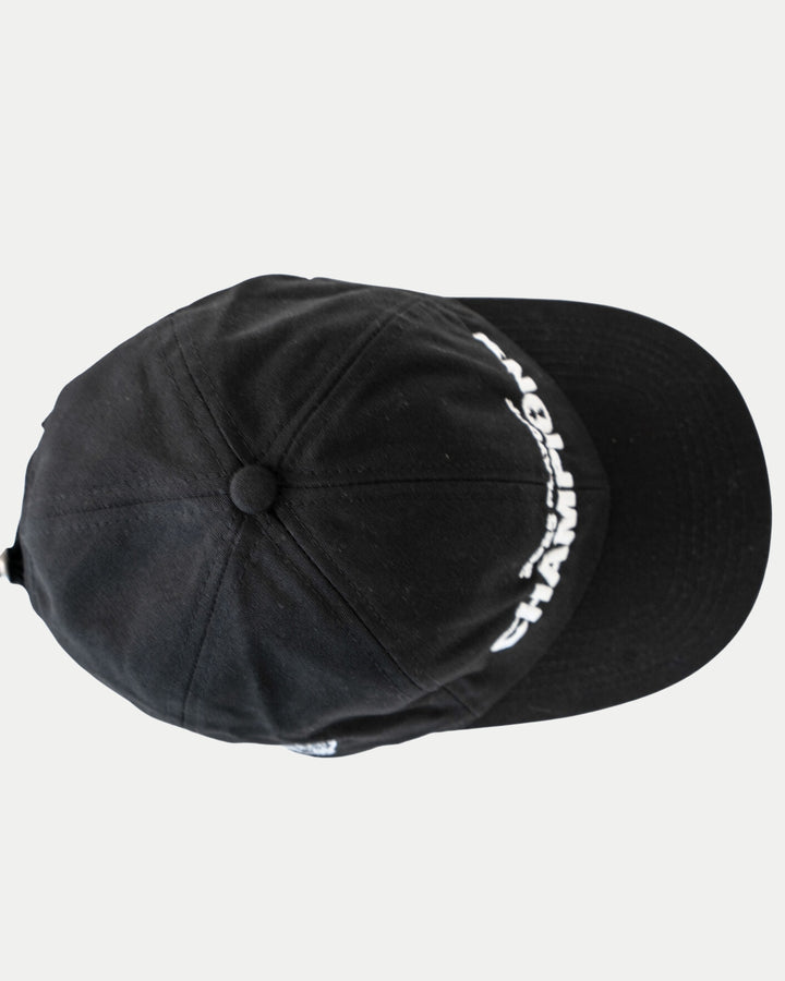 The Nottingham Panthers Made To Order Playoff Champions Panthers 2025 Organic Cotton Dad Cap in black & white, seen from above, features white embroidery along the right brim and crown, crafted from 100% organic cotton on a plain white background.