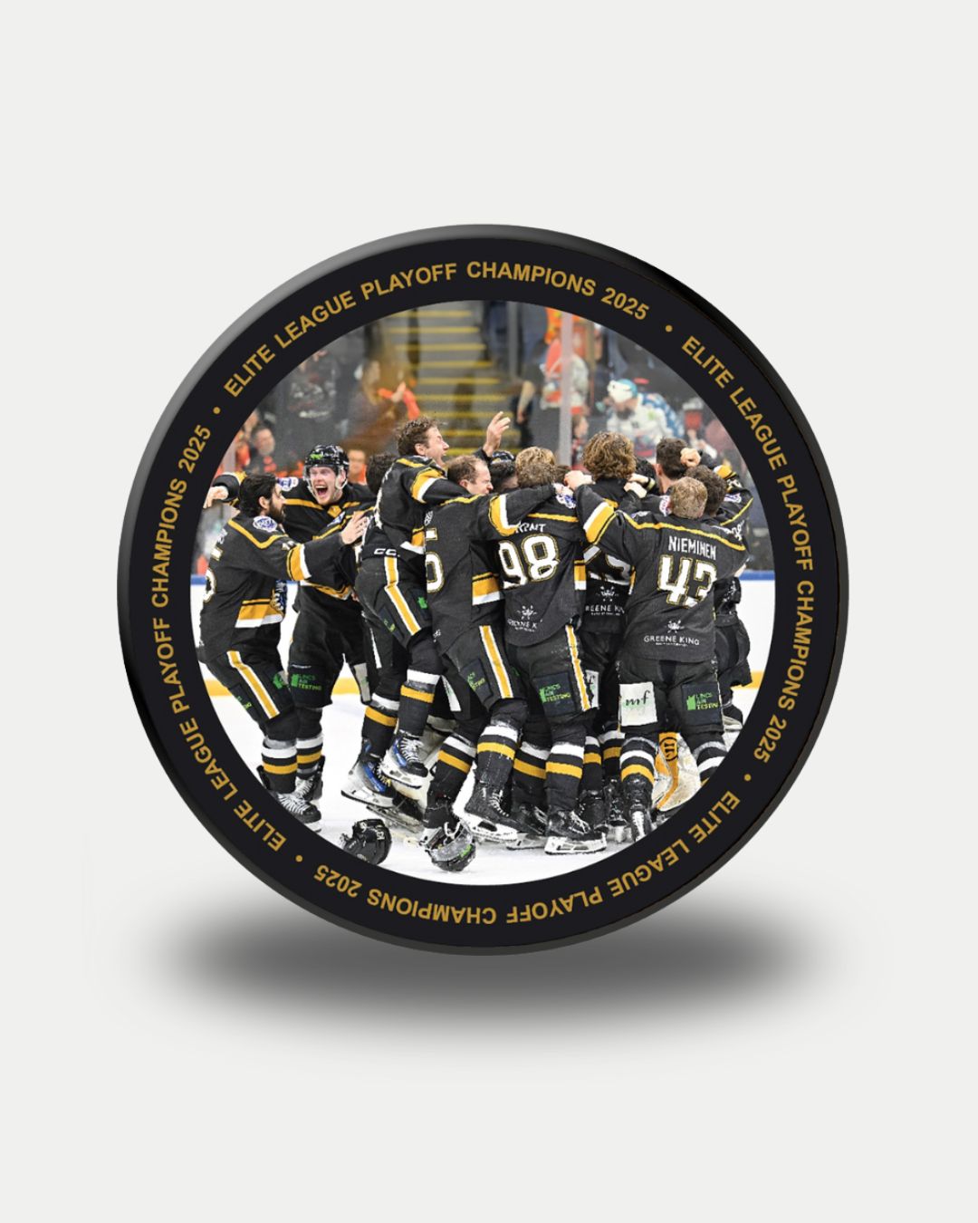 The Panthersland Nottingham Panthers Playoff Team Winning Puck 2025 features a team photo in black and yellow uniforms celebrating, with Elite League Playoff Champions 2023 in bold gold text around the edge.