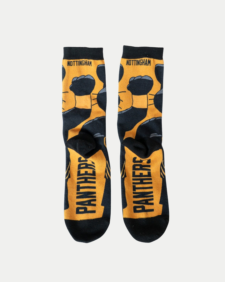 The Nottingham Panthers Paws Socks by Nottingham Panthers are black and gold, featuring a bold paw print design, PANTHERS on the sole, and NOTTINGHAM near the top cuff.