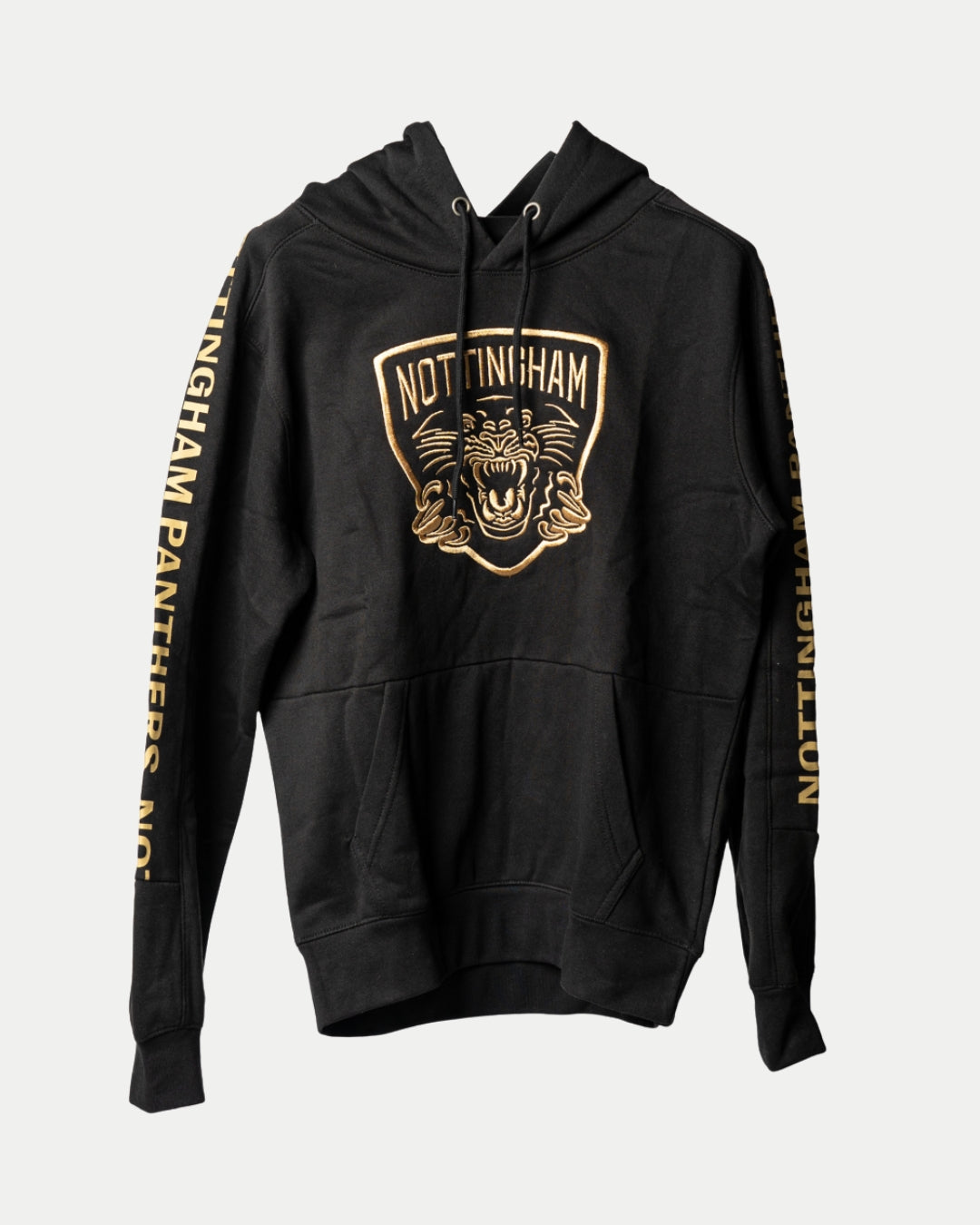 The Nottingham Panthers Golden Twill Hockey Club Hoodie Junior features a large team logo on the front, gold NOTTINGHAM PANTHERS text on each sleeve, a cozy front pocket, and an adjustable drawstring hood.
