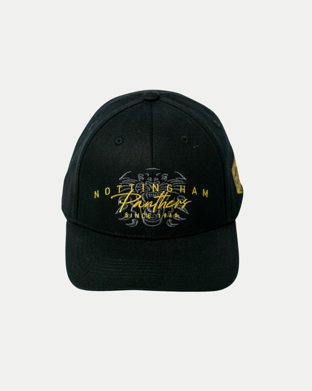 The Nottingham Panthers Signature Cap 25-26 by Panthersland is a black cap with yellow embroidered Nottingham Panthers and Since 1946, plus a subtle panther design—ideal official merchandise for devoted fans.