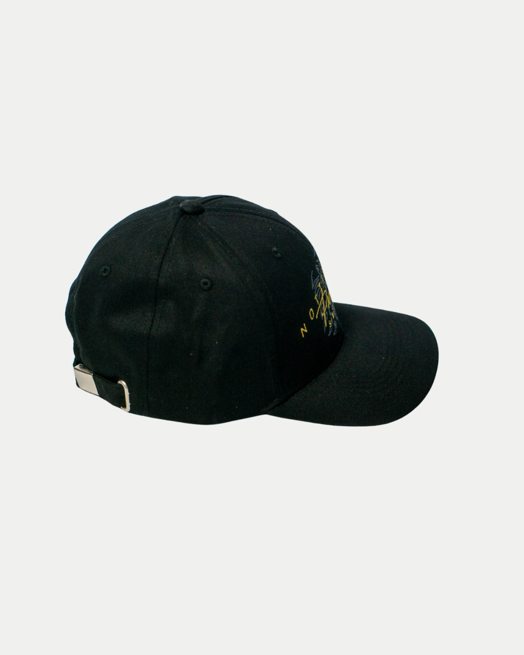 The Panthersland Nottingham Panthers Signature Cap 25-26 is a black cap with a curved brim, metal buckle adjustment, and subtle yellow side writing, shown on a white background—perfect for any fan.