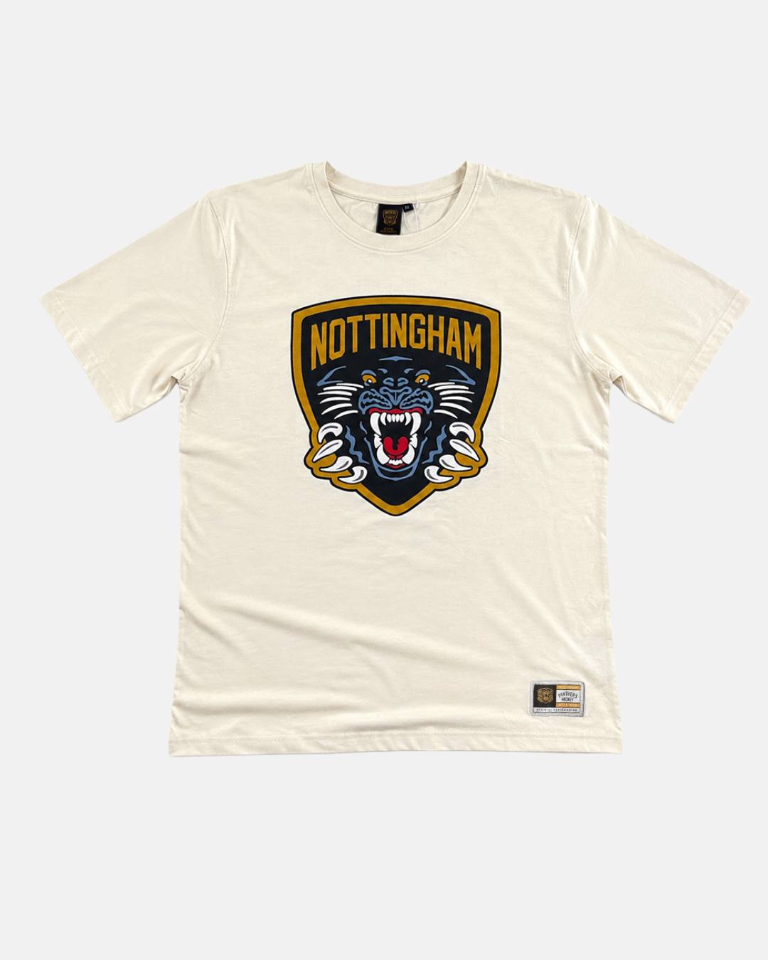 Introducing the 26-27 Kids Off White Crest T-Shirt by Panthersland—a cream-colored, relaxed-fit heavy tee made for everyday style. Featuring a bold Nottingham Panthers crest with a striking puff print and an eye-catching roaring black panther graphic on the front, this tee also includes a small black and gold label sewn near the bottom hem. Perfect for young fans seeking standout Nottingham Panthers style.