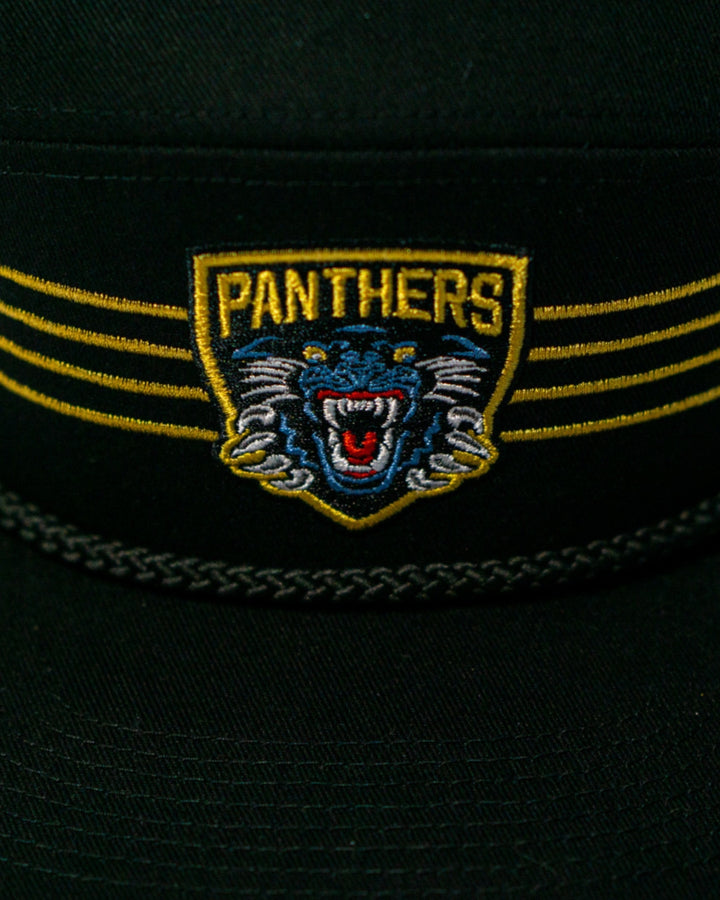 The Panthersland Nottingham Panthers 25-26 Four Stripe Flatbrim Cap is black with a yellow and blue embroidered roaring panther crest and bold gold stripes on each side.