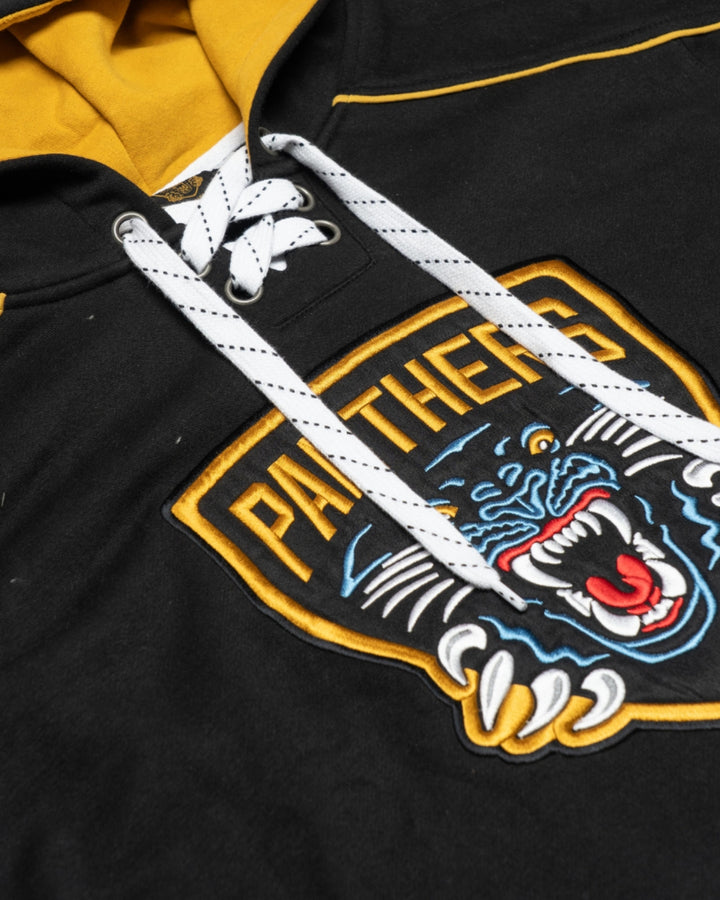 Close-up of the Nottingham Panthers Hockey Hoodie Striped by Panthersland, showcasing lace-up details, a yellow-lined hood, embroidered roaring panther logo, and bold yellow PANTHERS lettering.